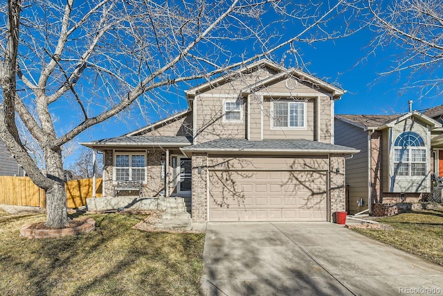 view of front of house with a front lawn and a garage