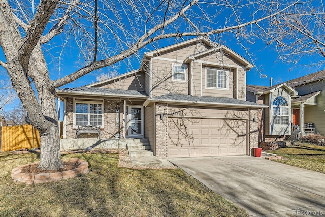 view of front of home featuring a front lawn and a garage