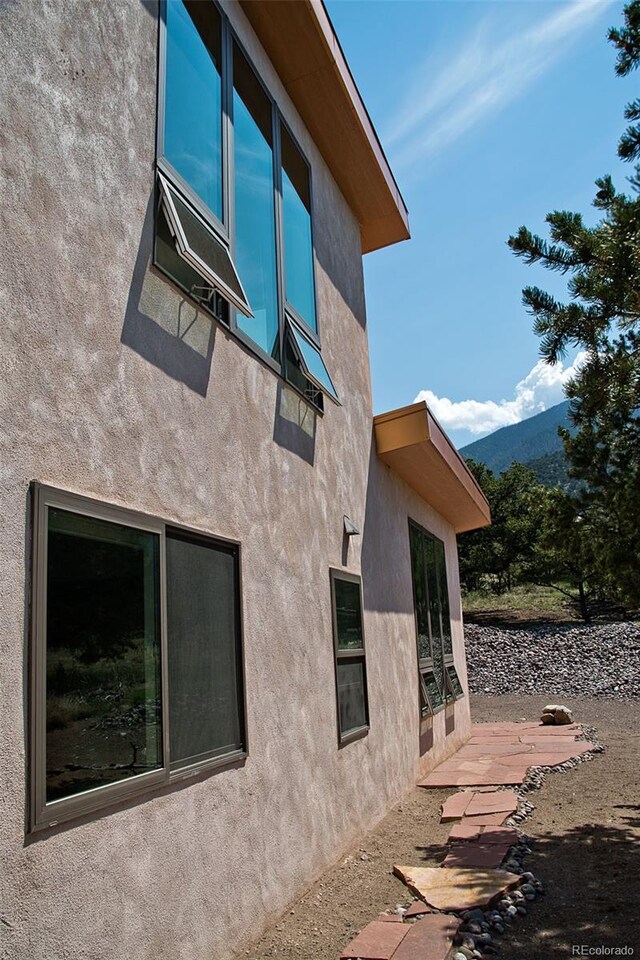 view of home's exterior featuring a mountain view