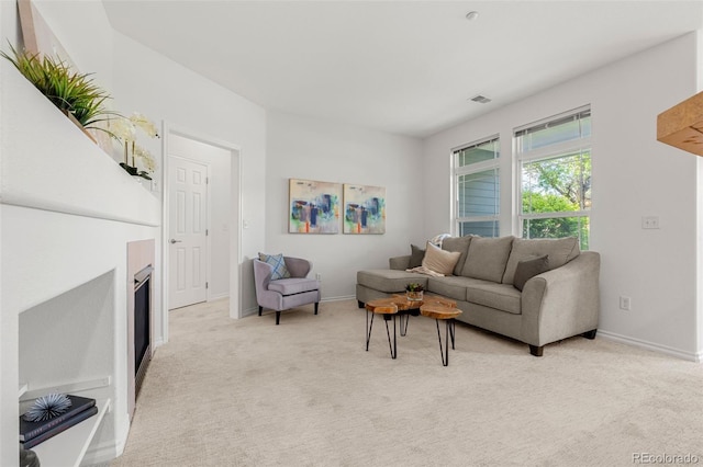 3329 Molly Ln, Broomfield, CO 80023 - living room with light colored carpet, a fireplace, and baseboards