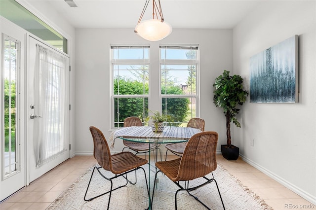 3329 Molly Ln, Broomfield, CO 80023 - dining room with light tile patterned floors and baseboards