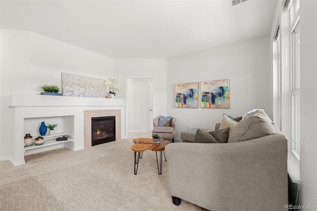 3329 Molly Ln, Broomfield, CO 80023 - carpeted living room with a tiled fireplace