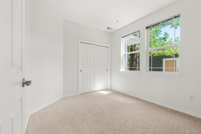 3329 Molly Ln, Broomfield, CO 80023 - unfurnished bedroom featuring carpet flooring, baseboards, and a closet