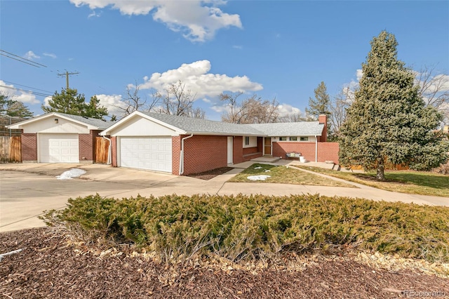 single story home with a garage