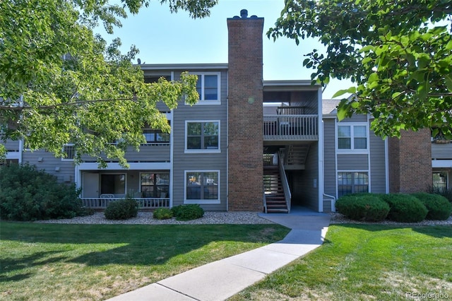 view of property featuring stairway