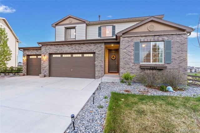 7207 S Scottsburg Way, Aurora, CO 80016 - view of front facade featuring a garage, driveway, and brick siding