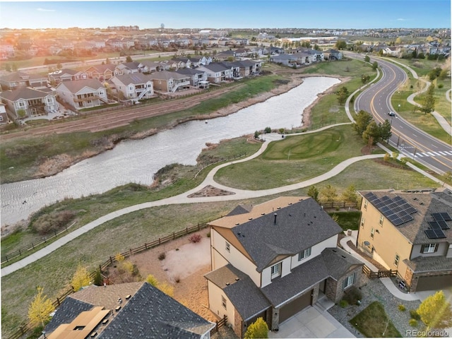 aerial view featuring a residential view and a water view