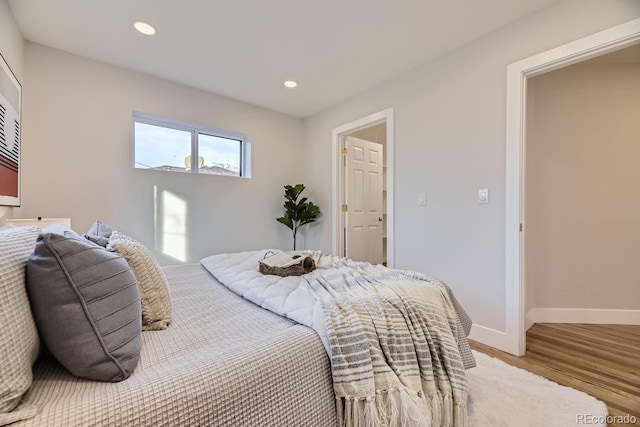 bedroom featuring hardwood / wood-style flooring