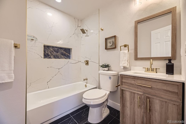 full bathroom featuring toilet, vanity, and tiled shower / bath