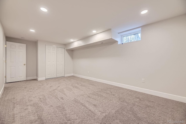 basement with carpet flooring