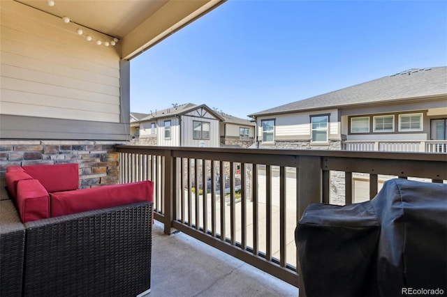 balcony with a residential view and grilling area