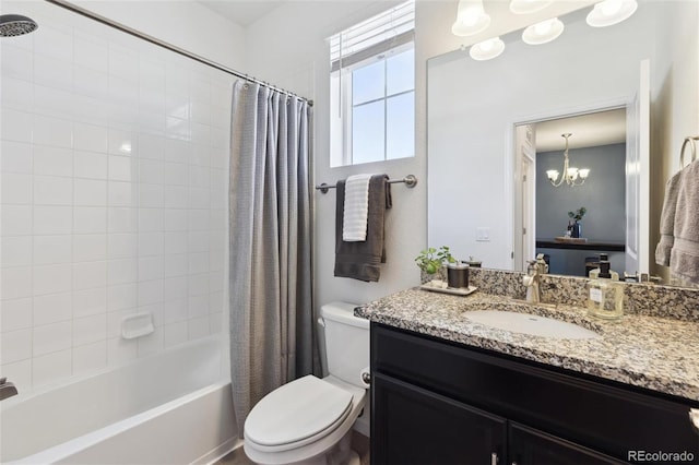 bathroom featuring a chandelier, shower / bathtub combination with curtain, toilet, and vanity