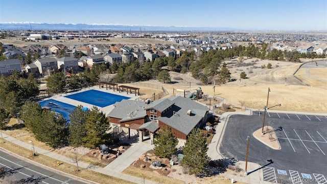 drone / aerial view with a residential view and a mountain view