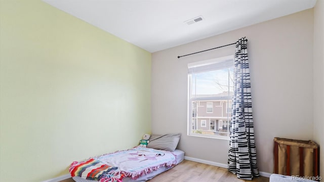 bedroom featuring light hardwood / wood-style floors