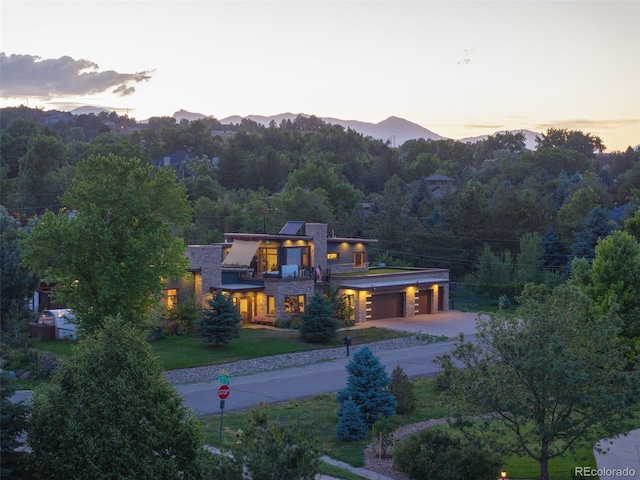 aerial view at dusk with a mountain view