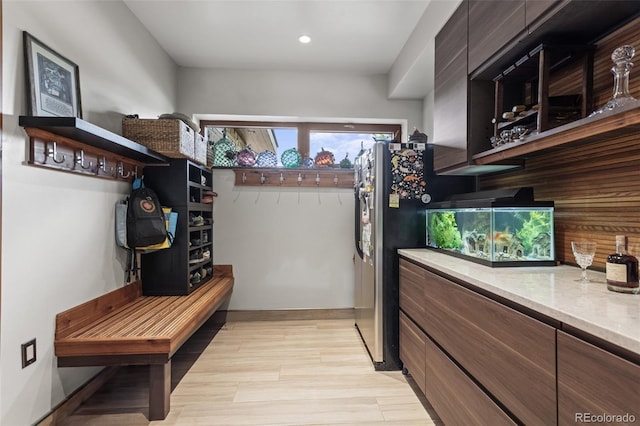 kitchen with dark brown cabinetry