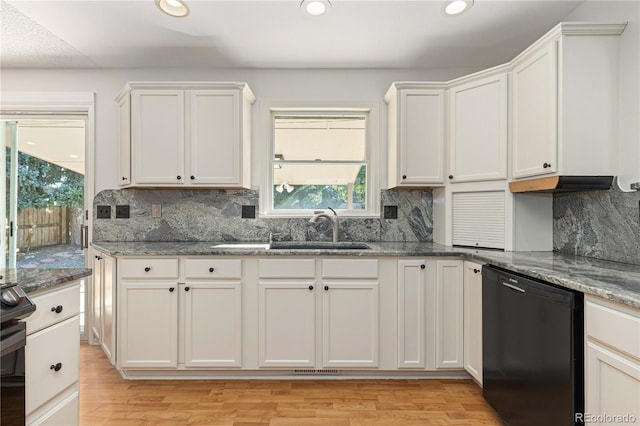 kitchen featuring white cabinetry, light hardwood / wood-style flooring, and dishwasher