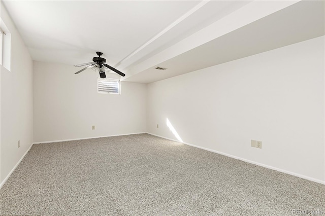 spare room with ceiling fan and carpet flooring