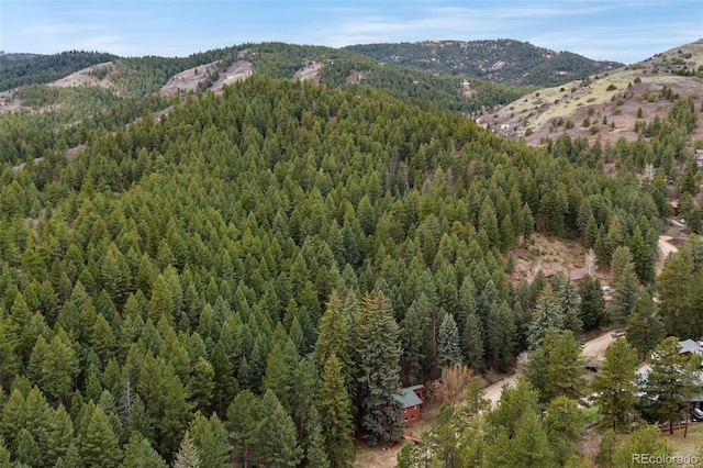 property view of mountains with a forest view