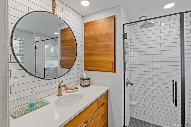 bathroom with vanity and an enclosed shower