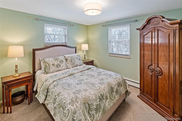 carpeted bedroom with a baseboard radiator