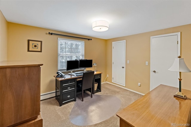 office area featuring light carpet and a baseboard heating unit