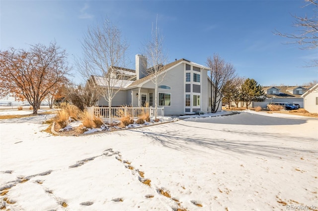 view of snow covered property