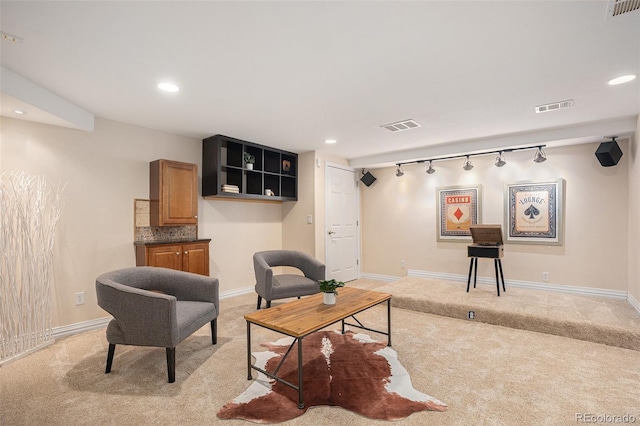 7624 Russell Ct, Arvada, CO 80007 - living area featuring light colored carpet, rail lighting, baseboards, and recessed lighting