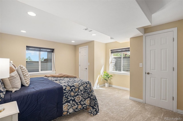7624 Russell Ct, Arvada, CO 80007 - bedroom featuring light colored carpet, baseboards, and recessed lighting