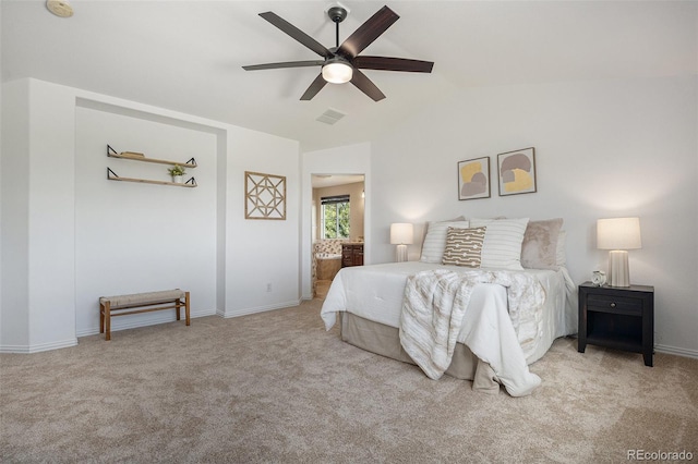 7624 Russell Ct, Arvada, CO 80007 - carpeted bedroom featuring lofted ceiling, baseboards, ceiling fan, and connected bathroom