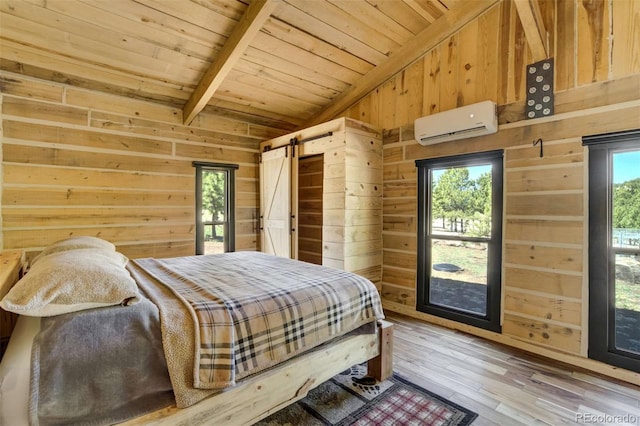 bedroom with a wall mounted air conditioner, wood ceiling, wooden walls, a barn door, and multiple windows