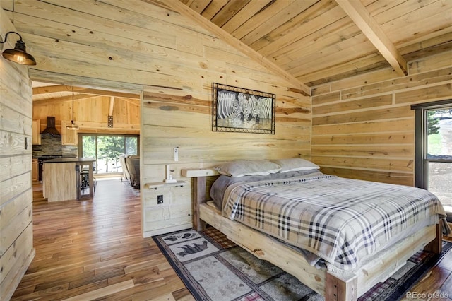 bedroom featuring wood ceiling, wood walls, and wood-type flooring