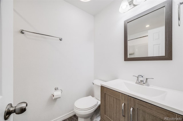3090 W 107th Pl Unit F, Westminster, CO 80031 - bathroom featuring vanity and toilet