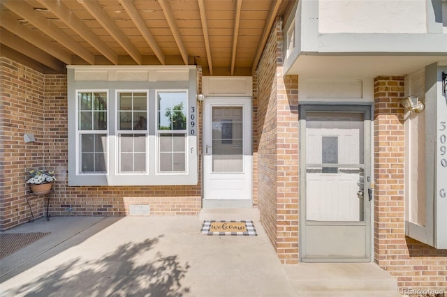 3090 W 107th Pl Unit F, Westminster, CO 80031 - property entrance with brick siding and stucco siding