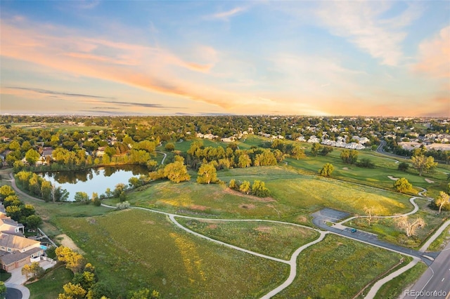 3090 W 107th Pl Unit F, Westminster, CO 80031 - aerial view at dusk of a water view, view of golf course, and a residential view