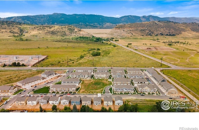 aerial view featuring a mountain view