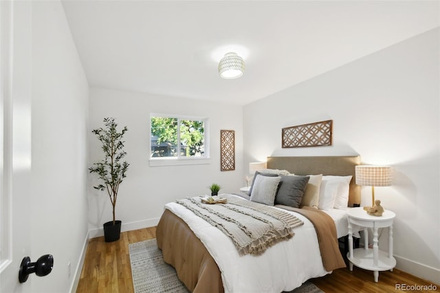 bedroom featuring hardwood / wood-style flooring