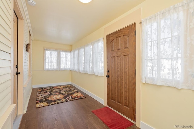 224 4th Ave, Severance, CO 80550 - entrance foyer with wood finished floors and baseboards