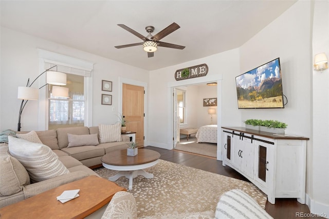 224 4th Ave, Severance, CO 80550 - living room with ceiling fan and dark wood-style flooring