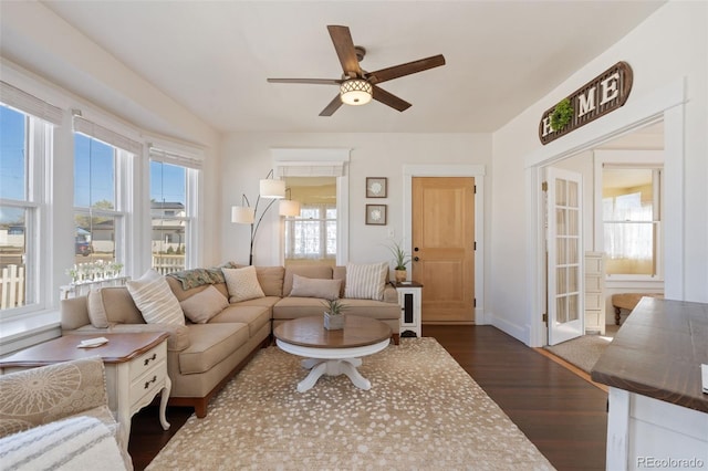 224 4th Ave, Severance, CO 80550 - living room featuring dark wood-type flooring, a ceiling fan, and french doors