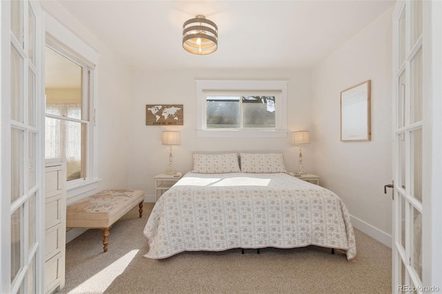 224 4th Ave, Severance, CO 80550 - carpeted bedroom featuring french doors and baseboards