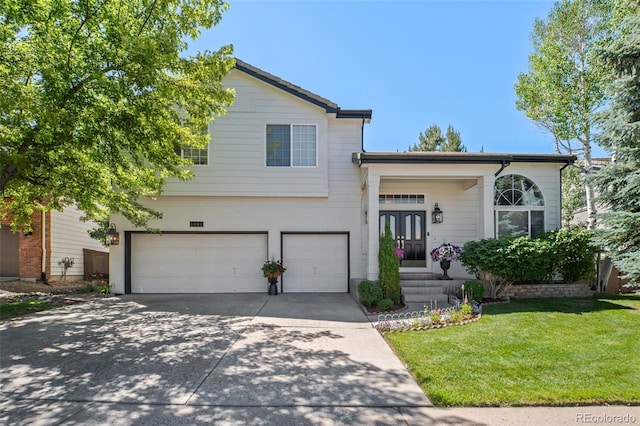 2062 Hyacinth Rd, Highlands Ranch, CO 80129 - tri-level home with an attached garage, driveway, and a front yard