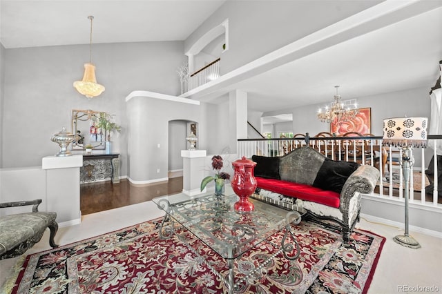 2062 Hyacinth Rd, Highlands Ranch, CO 80129 - living room featuring a chandelier and arched walkways