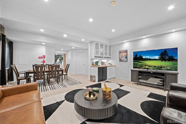 2062 Hyacinth Rd, Highlands Ranch, CO 80129 - living area with recessed lighting, bar area, and light carpet