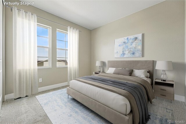 17196 W 92nd Loop, Arvada, CO 80007 - bedroom with baseboards and carpet flooring