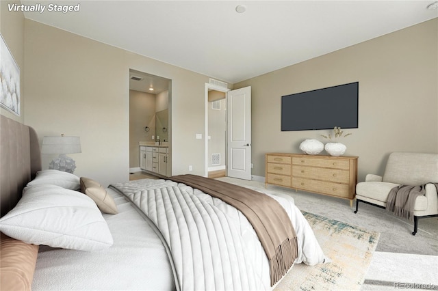 17196 W 92nd Loop, Arvada, CO 80007 - bedroom featuring carpet flooring and ensuite bathroom