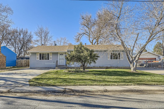 ranch-style house with a front yard