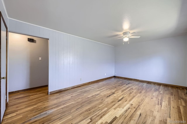 unfurnished room featuring ceiling fan and light hardwood / wood-style floors