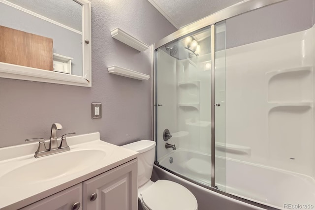 full bathroom with toilet, vanity, shower / bath combination with glass door, and a textured ceiling