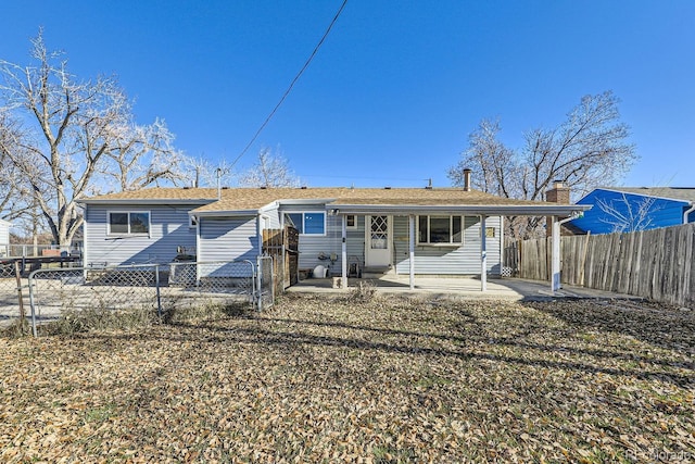 back of property featuring a patio area